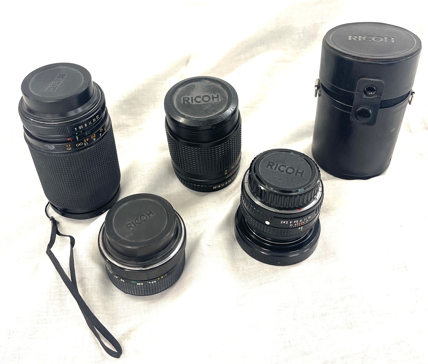 Selection 4 Ricoh camera lens / lenses to include Koboron wide angle 1..2.8 F=28mm, Rikenon 1.2