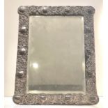 Large Antique silver dressing table mirror measures approx 35cm by 27cm cherub details age relaed