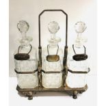 Large antique 3 bottle silver plated stand tantalus measures approx height 36cm by 31cm wide 3 cut