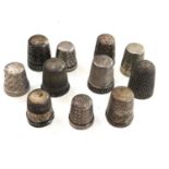 11 antique silver thimbles