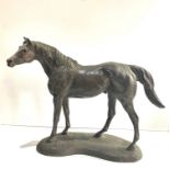 Large bronze type figure of a horse measures approx 40cm wide height 30cm