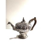 Fine 18th century silver tea pot floral embossed decoration London silver hallmarks weight 695g