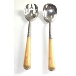 Large victorian silver salad servers with bone handles measure appox 28cm long