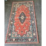 Small rug measures approx 58" long by 31.5" wide