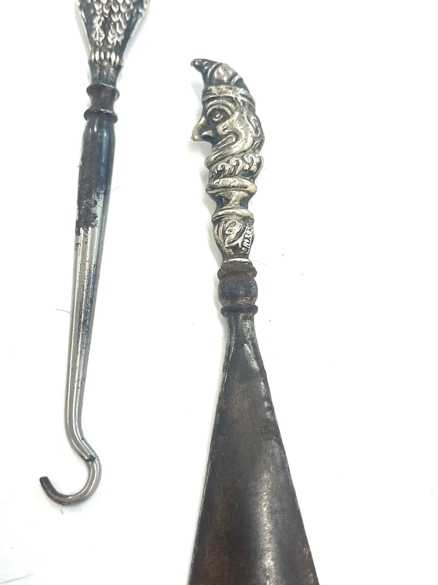 Antique silver handled shoe horns and button hook, owls with red eyes and Mr Punch - Image 2 of 3