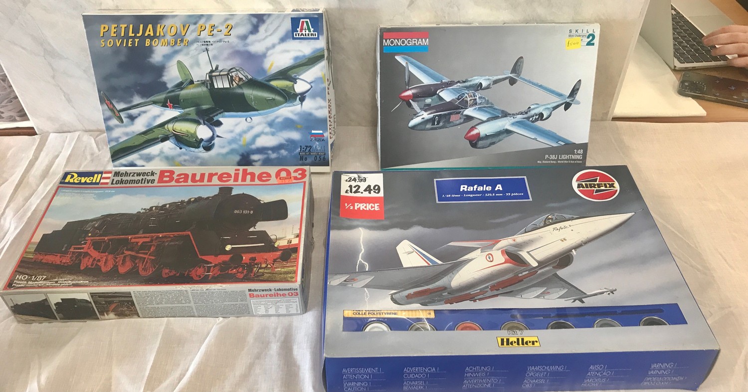 Selection of aircraft models in original boxes, Italeri Siviet bomber, Monogram P38J, Revell train