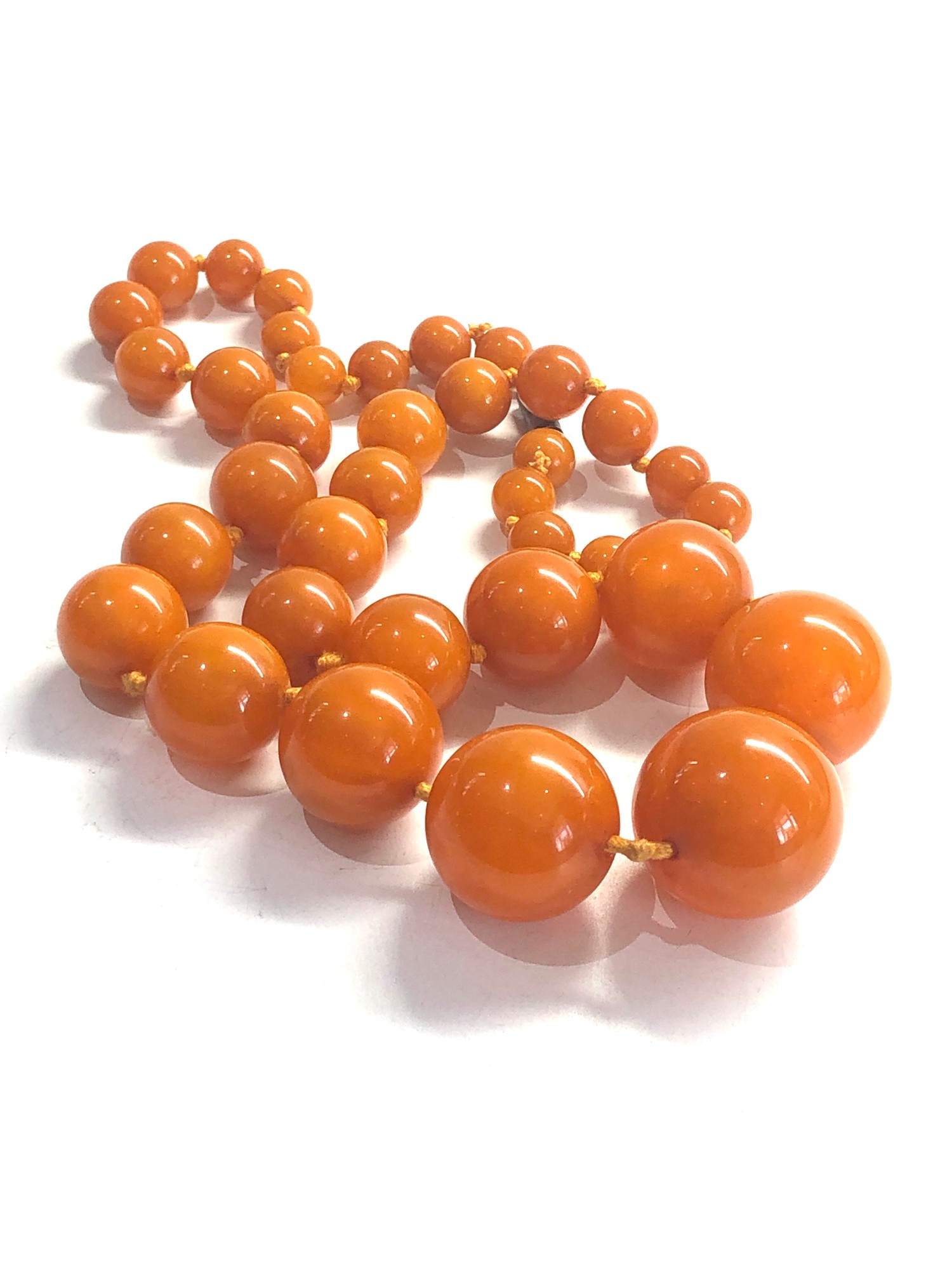 Round egg yolk amber type necklace weight 93g