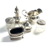 selection of silver items inc salt pepper milk jug etc total weighable silver weight 200g