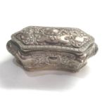 Antique silver hinged lid embossed box measures approx 14cm by 7.5cm height 5.5cm weight 140g