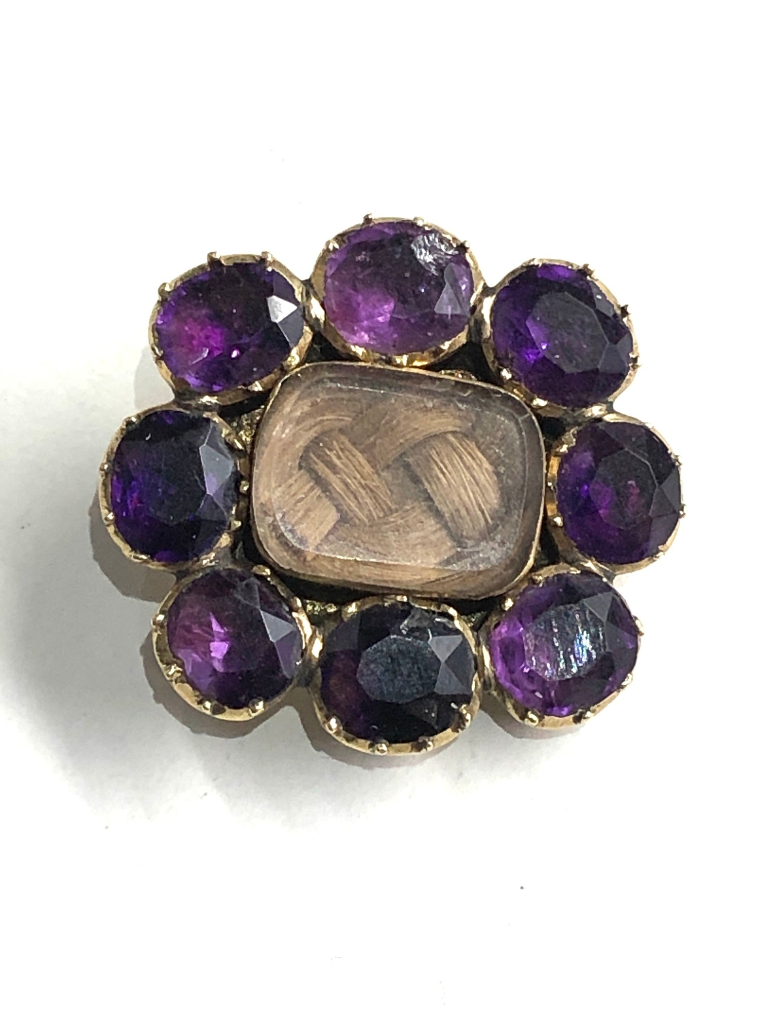 Antique georgian gold amethyst mourning brooch measures approx 2.4cm by 2.2cm weight 5g