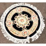 Round Chinese rug measures approx 38" diameter