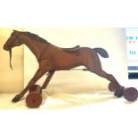Vintage ride on mechanical horse, approximate height 21 inches, length 37 inches