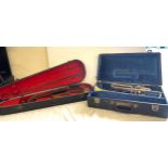 Violin in case with bow, brass Trumpet in case