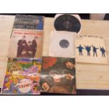 Selection of Beatles records includes Abbey road, Introducing the Beatles, Parlophone etc