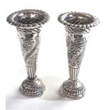 Pair of antique silver rose vases London silver hallmarks measure approx 11cm tall weighted bases