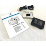 Minolta dimage XT camera, manual, battery charger etc