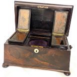 Coffin topped rosewood tea caddy, measures approx 8" tall 13" wide 7.5" depth