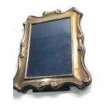 Large silver picture frame measures approx 25cm by 21cm