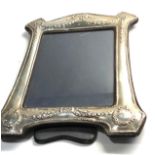 Large silver picture frame measures approx 30cm by 24cm