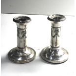 Small pair of antique silver candlesticks age related marks and wear measure approx height 9.2cm