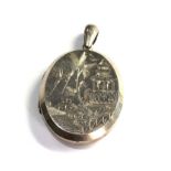 Victorian silver locket measures approx 5.3cm drop by 3.2cm wide