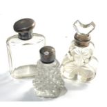 3 silver top scent bottles