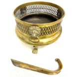 Brass footed jardiniere with lion handles and brass shoehorn.