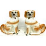 Pair of Staffordshire dogs, one damaged to corner, measures approx 13" tall