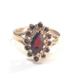 9ct gold garnet ring weight 3.5g chip and wear to garnets