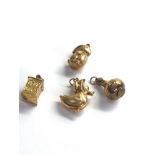 4 9ct gold charms 4.6g