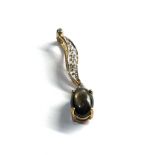 9ct gold blackstar sapphire & diamond pendant