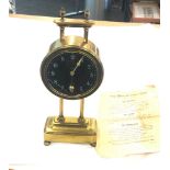 Antique gravity brass the silent keyless clock by Watson - glass cracked