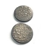 2 islamic silver coins measure 20mm dia and 19mm dia