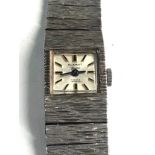 Ladies Silver Summit Geneve vintage wristwatch hand wind bark effect strap working order but no