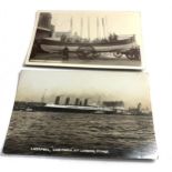 2 antique real photo postcards R.M.S Lusitania at liverpool landing stage & watchet lifeboat & crew