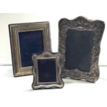 3 silver hallmarked picture frames largest measures approx 20cm by 15cm