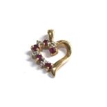 9ct gold ruby & diamond pendant weight 1.2g