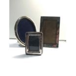 3 silver hallmarked picture frames largest measures approx 15cm by 11cm