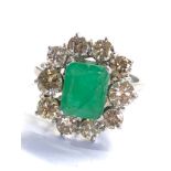 Fine Vintage platinum emerald & diamond ring est 2ct diamonds set with large central emerald that