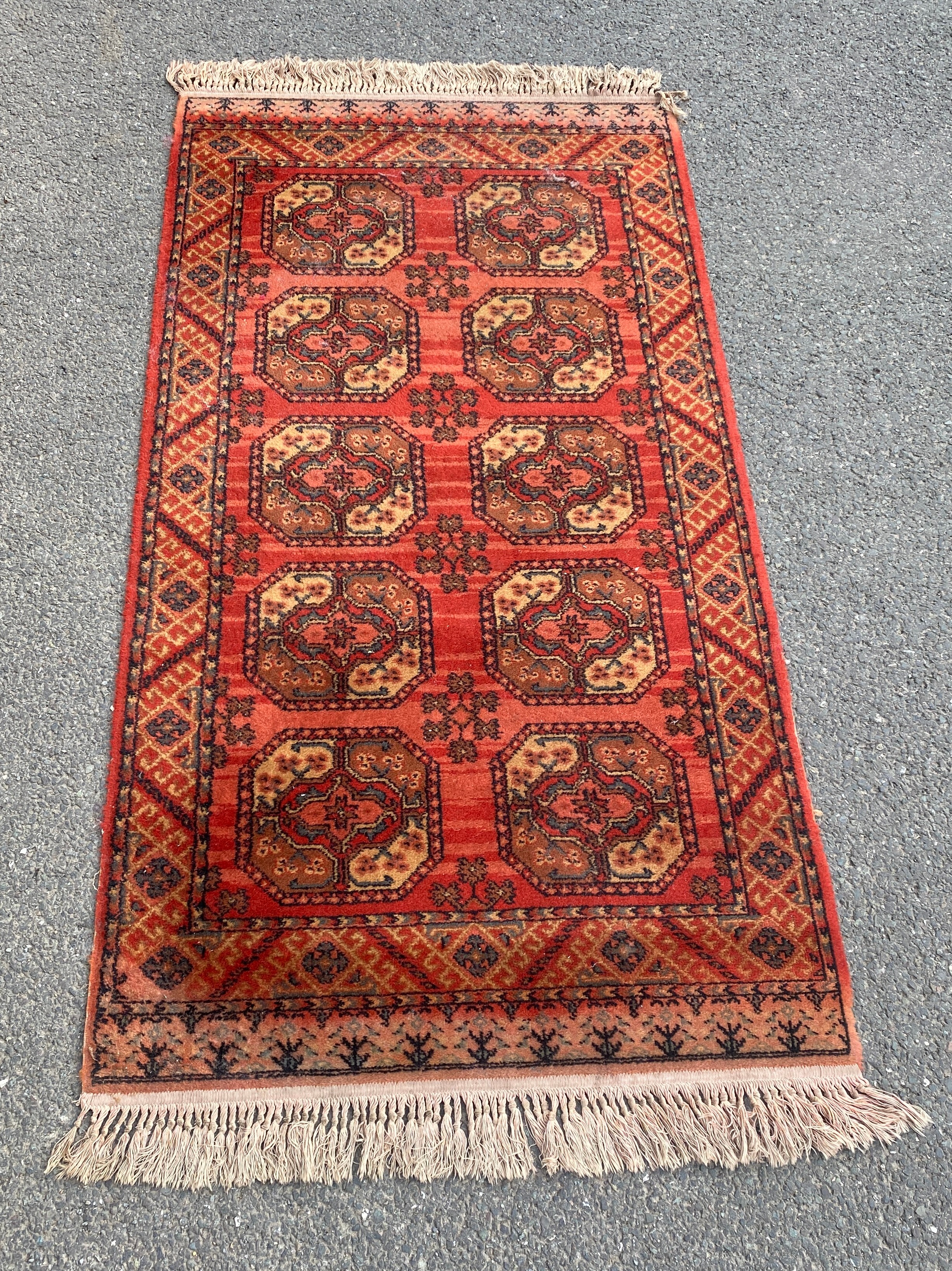 Vintage Mossow rug, approximate measurements: Length 71 inches, Width 33 inches