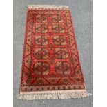 Vintage Mossow rug, approximate measurements: Length 71 inches, Width 33 inches