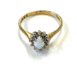 9ct gold opal and diamond halo ring, approximate weight 2g