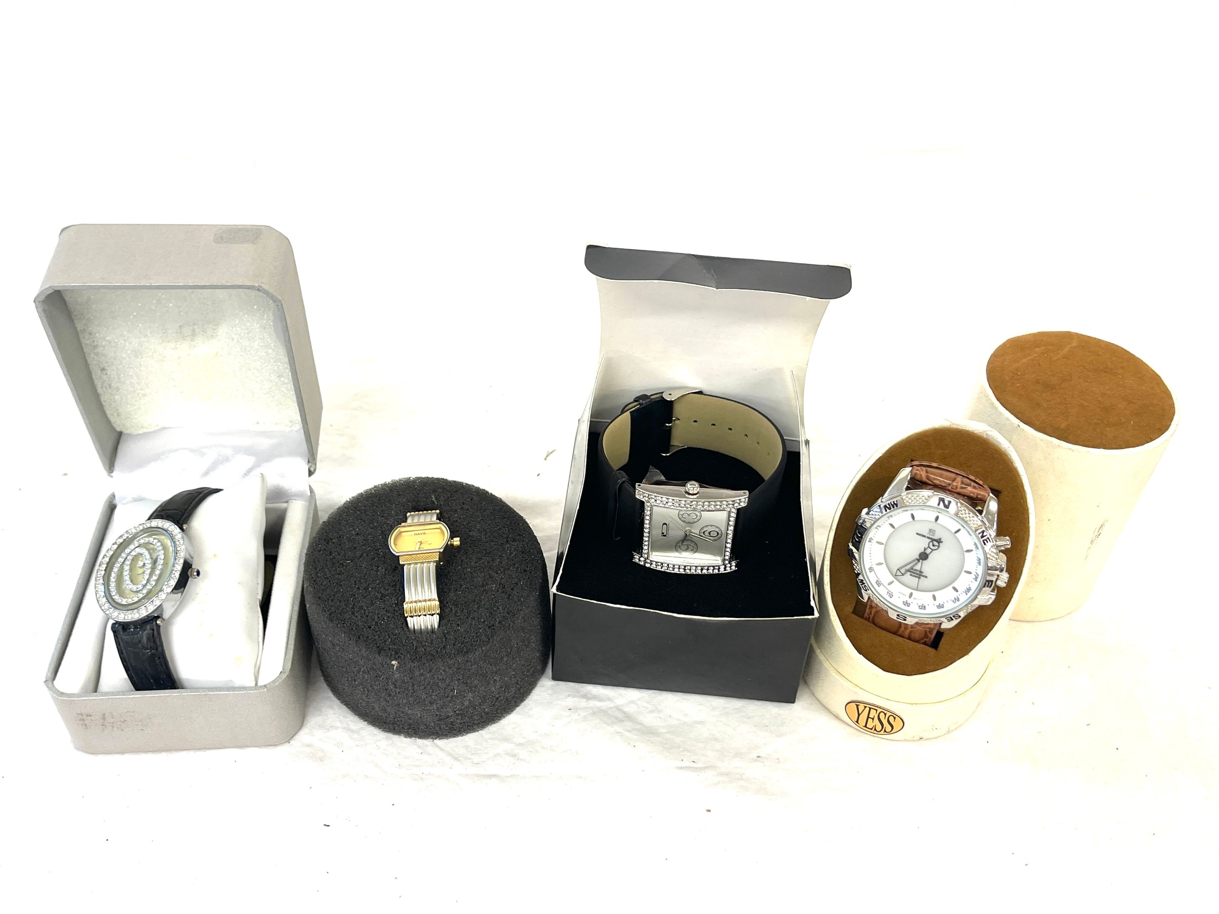 Selection of 4 boxed Yess, Figaro and Rave battery operated ladies and mens watches, all in