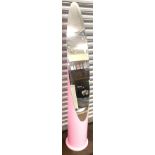 Tall pink lipstick freestanding mirror, some colour has faded due to sunlight, approximate height 63