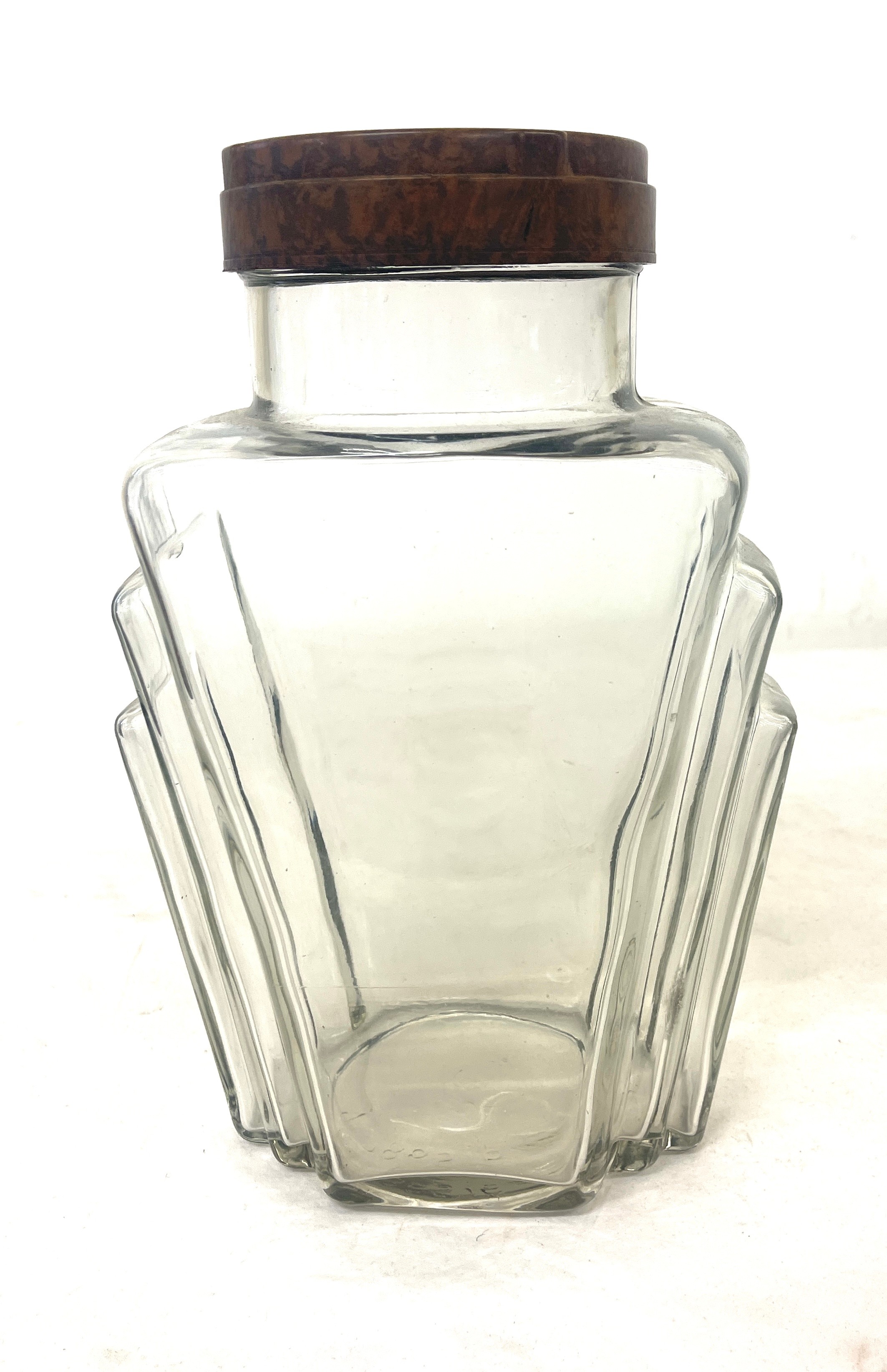 Art Deco glass jar with bakelite lid (Sharps) , approximate measurements: Height 11.5 inches,