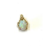 9ct gold opal and diamond pendant, approximate weight 0.8g