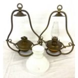 Pair hanging oil lamps, one has a funnel and shade
