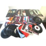 Selection of 45's, LP's, includes Brian Adams, Eric Clapton, Gloria Estafan etc