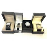 Selection of 4 boxed Henley, Figaro and Versedge battery operated ladies and mens watches, all in