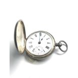 Antique silver full hunter pocket watch .J.B.Dent London ticking but no warranty given spares or